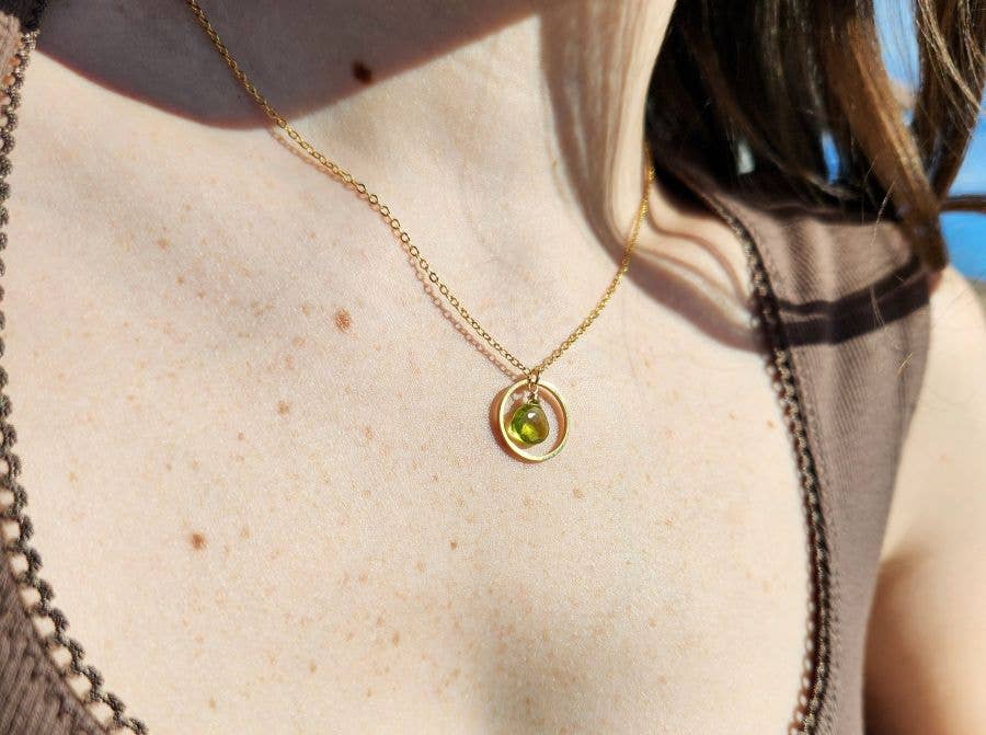 Peridot Inside Gold Circle Pendant Necklace