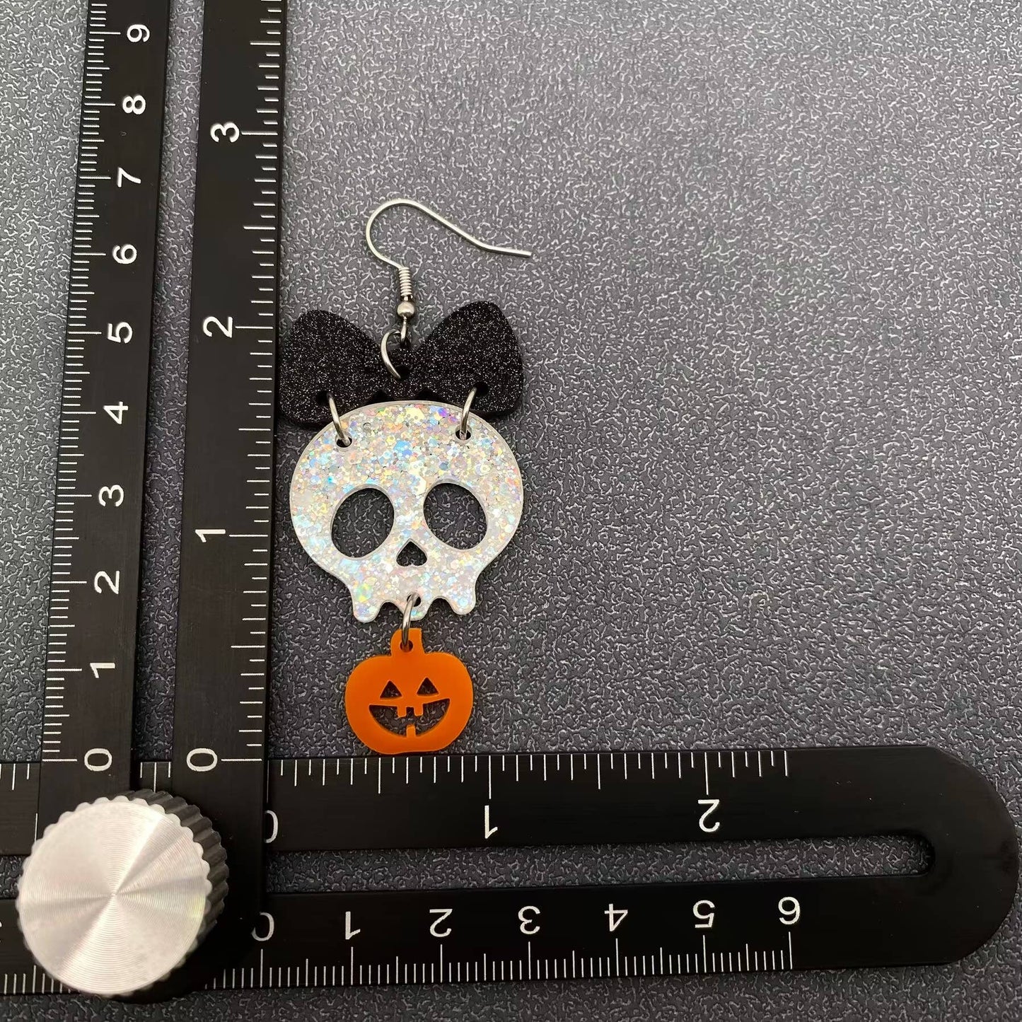 Earrings - Acrylic Pumpkin Skull Bow Linked Dangle