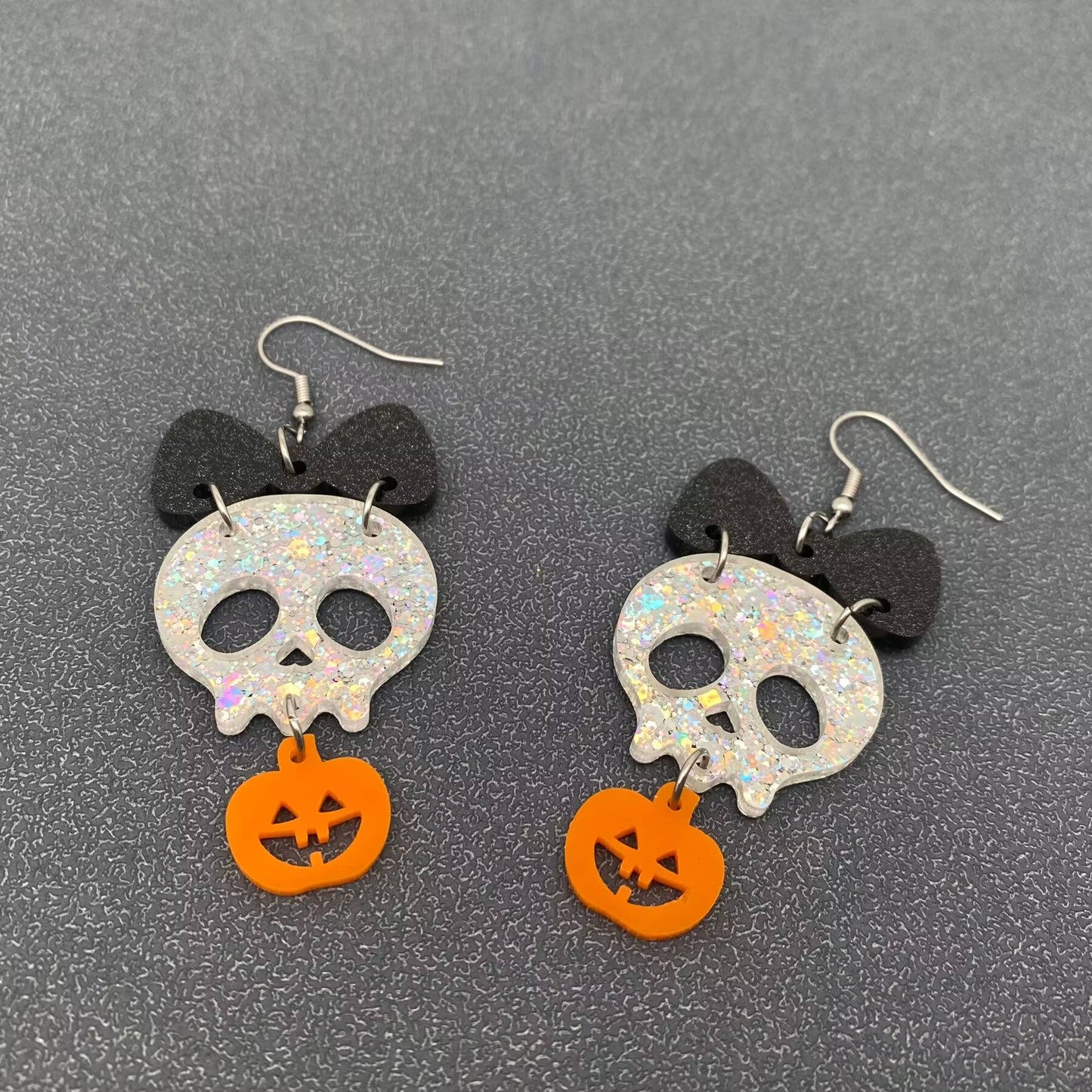 Earrings - Acrylic Pumpkin Skull Bow Linked Dangle