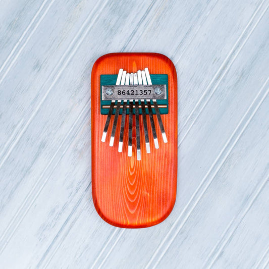 Color Pine Thumb Piano: Orange / Pentatonic