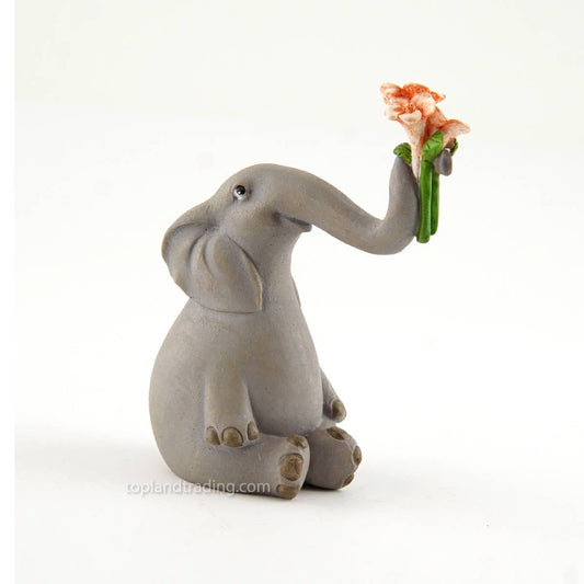 Elephant Holding Up Flowers