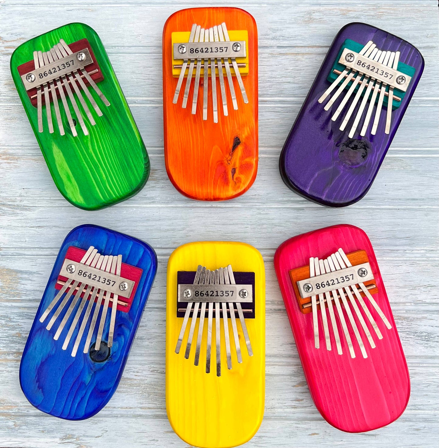 Color Pine Thumb Piano: Orange / Pentatonic