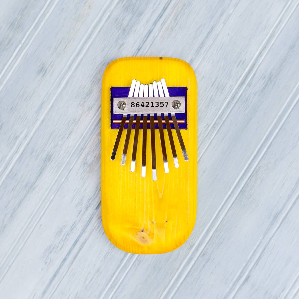 Color Pine Thumb Piano: Orange / Pentatonic