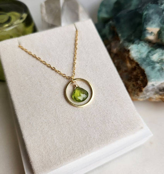 Peridot Inside Gold Circle Pendant Necklace