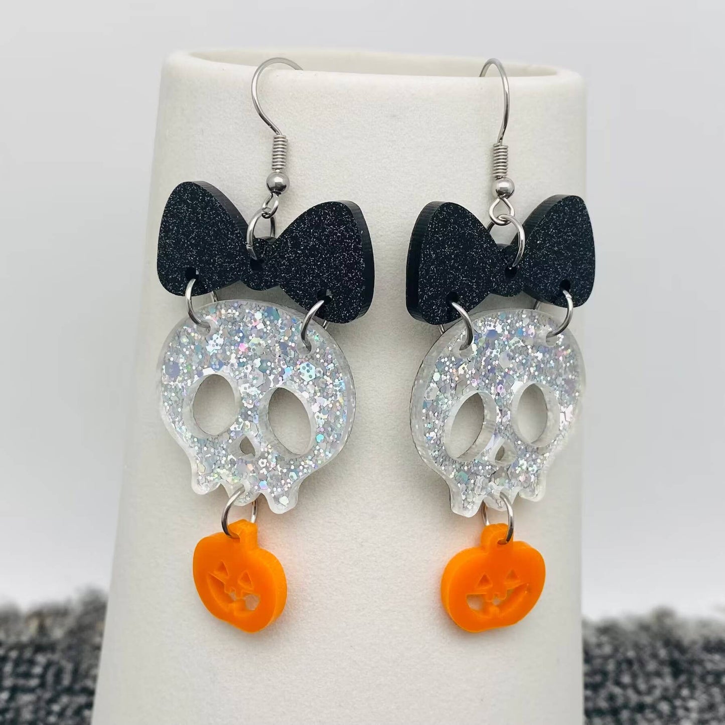 Earrings - Acrylic Pumpkin Skull Bow Linked Dangle