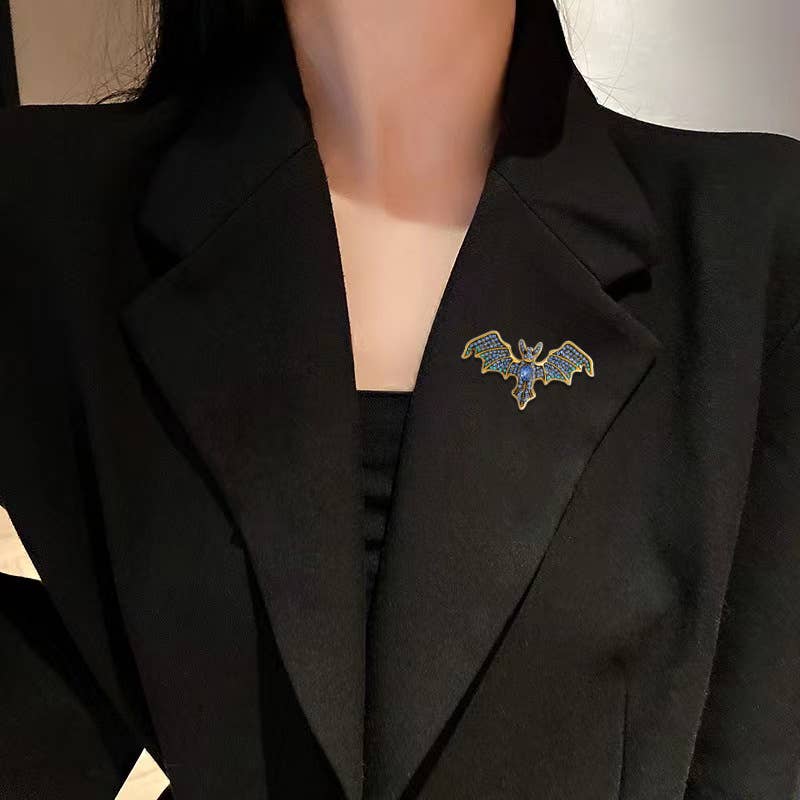 Vintage Rhinestone Devil Bat Brooch: Blue