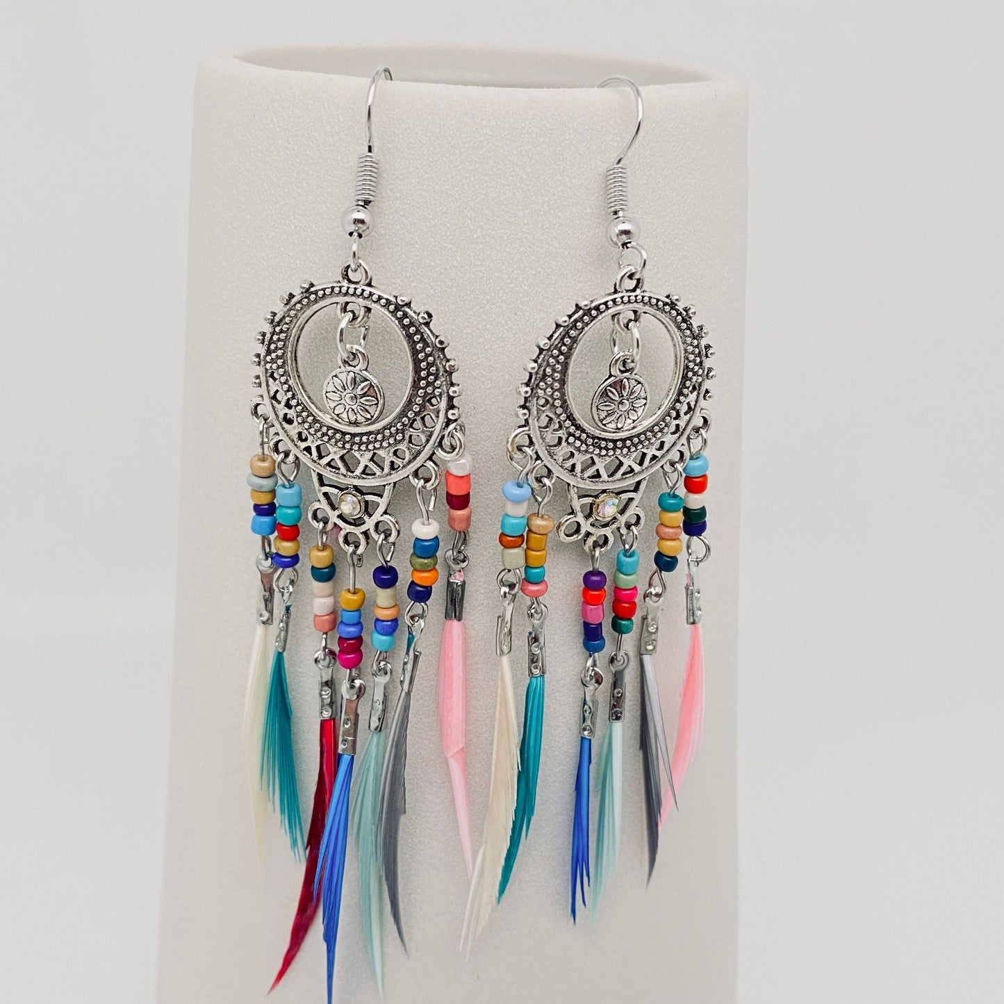 Round Hollow-out Bohemian Colorful Feather Tassels Earrings: Bronze